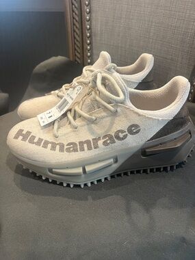 Adidas human race women size 8 men's size 7